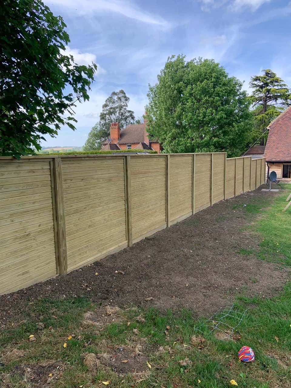 This is a photo of an acoustic fence installed by Fast Fix Fencing Oxted